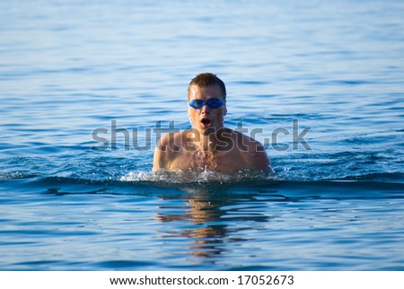 swimmer in clean ocean water