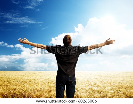 young man rest on wheat field