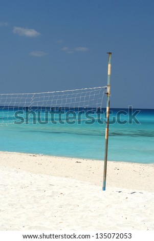sports net on the white sandy beach