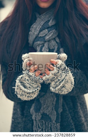 Close Up Of Woman Hands Holding A Mug Of Hot Beverage