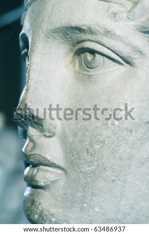 close up of marble statue face of a beautiful woman