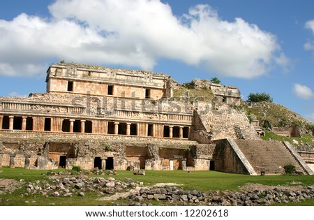 Mexican ruins of maya civilization over blue sky