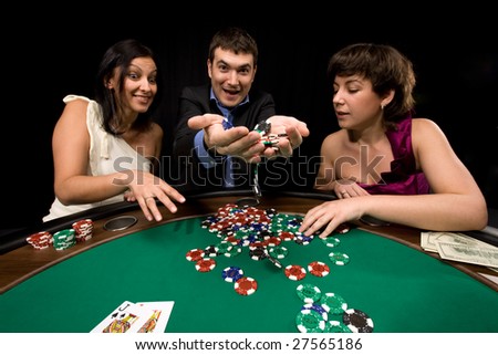 stock-photo-stylish-man-wins-in-the-casino-over-black-27565186.jpg