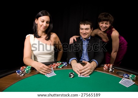 Company of friends having fun in the Vegas casino