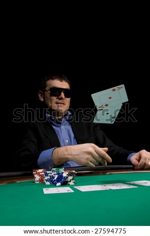 Flying cards in texas hold\'em poker over green casino table