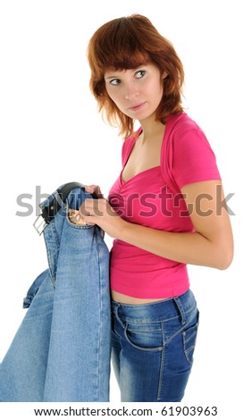 The woman takes money from a pocket of man\'s trousers.