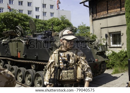 RADZIONKOW, POLAND - JUNE 04: Member of military  club  during military cars race at the time the celebration days of Radzionkow, June 04, 2011 in Radzionkow, Poland.