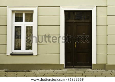 the front wall with door and window