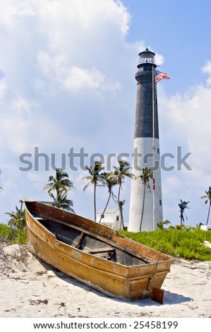 A small boat has been washed up onto the shore near to the historic Loggerhead Key lighthouse [1858] on the Dry Tortugas.