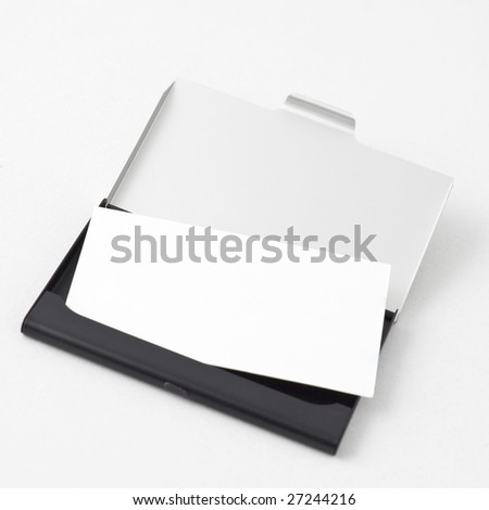Close-up of a business card in holder. Add your text inside. Shallow depth of field.