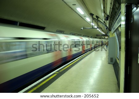 Tube train leaving station