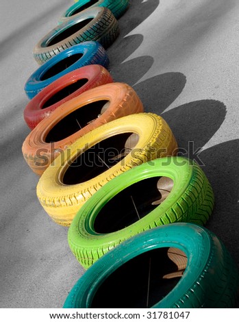 Colored tires. Racing. Vertical composition.