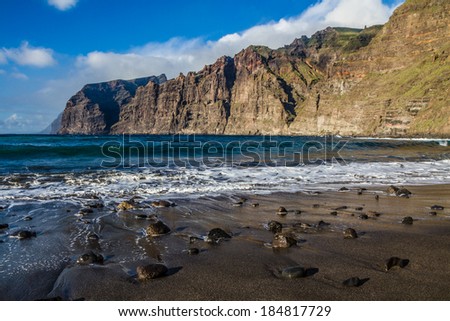 Stones on the Beach of Ocean Coast during Sunset - Los Gigantes, Tenerife, Canary Islands, Spain