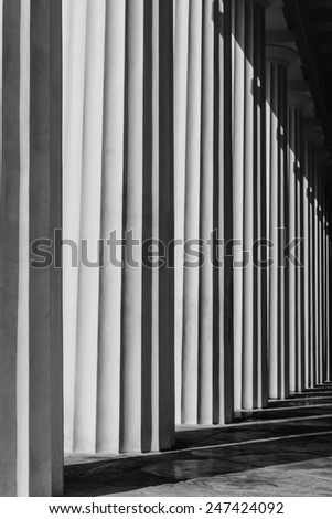 Abstract structure of black and white antic peristyle with shadows - antic columns, Vienna, Austria