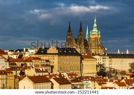 View of St. Vitus Cathedral and Prague Castle with Green Park and Cloudy Sky - Prague, Czech Republic