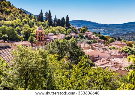 View Of The Village With The Landmark Of Church Bell Tower And The Whole Valley In The Background-Moustiers Sainte Marie, Provence, France