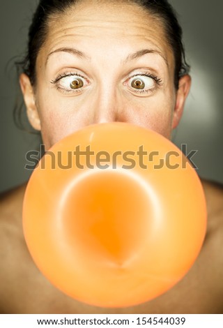 funny woman with balloon