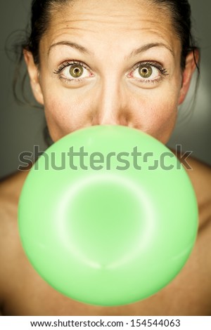 funny woman with balloon