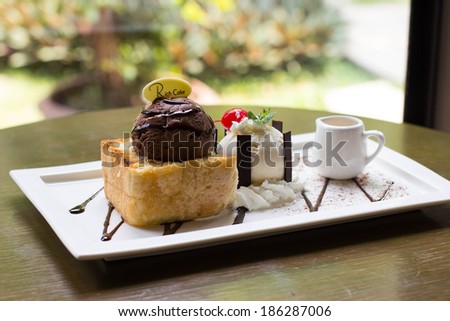 Rich cake , chocolate ice cream, chocolate ice cream on toasted bread with hot fudge