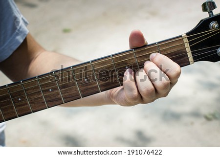 chord on an acoustic guitar, D position on a classical guitar