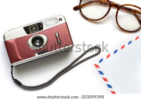 abstract image of Memory , film camera ,glasses and envelope on white background