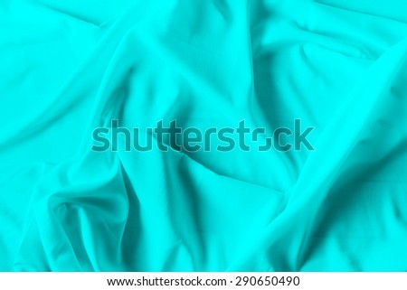 cyan cloth ,liquid wave or wavy folds background