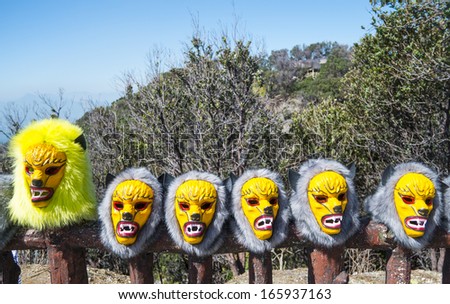 A row of gorilla masks for sale at Tangkuban Prahu volcano near Bandung, Java, Indonesia