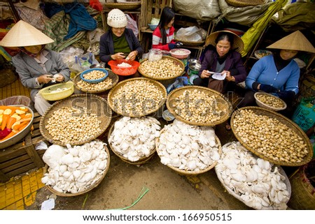 CIRCA MAY 2011 - DALAT, VIETNAM - Women selling mushrooms in the market, on 24 May 2011, in Dalat, Vietnam