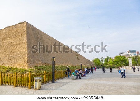 ZHENGZHOU, CHINA - APRIL 14, 2014 - The Shang Dynasty (1600-1000BCE) city wall remnants in downtown Zhengzhou, one of China\'s ancient capitals