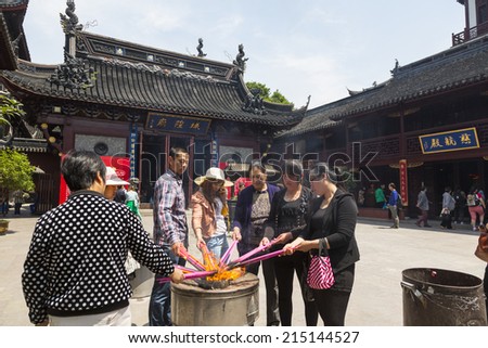 7 JANUARY 2014 - SHANGHAI, CHINA - People worship at the City God Temple, or Chenghuang Miao, in the Shanghai Old Town