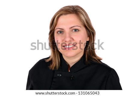 Beautiful blond wearing black chef coat in the restaurant food server industry. In studio on white background.
