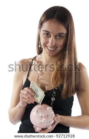 Young brunette women dressed nicely counts the money she is saving to put into her bank