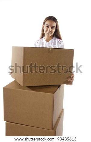Pretty homemaker or warehouse worker with boxes, packing to move to a new home or just moved in and moving stored items around to different rooms in the house. In studio on white background.