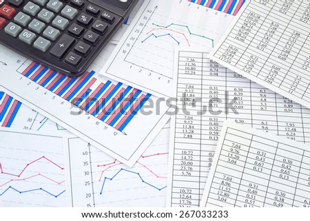 Image of financial tables graphs numbers for work business and economics