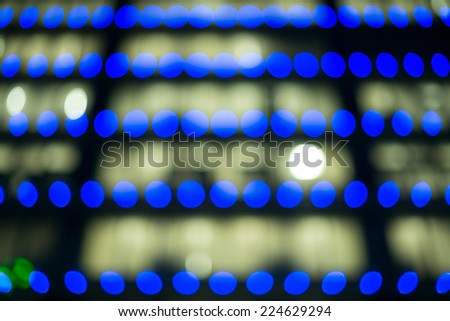 bokeh lights of an office building in the night