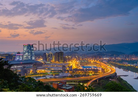 night view of taipei in nangang with traffic trails