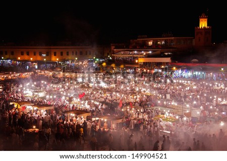 Jamaa El Fna is a square and market place in Marrakesh\'s medina quarter. As darkness falls, the square fills with dozens of food-stalls as the number of people on the square peaks.