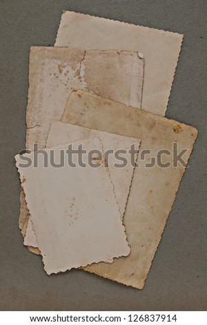 Damaged parchment or photos, as a banner for grunge,ornament, book, letter or history designs