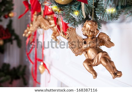 Christmas decoration with Christmas tree, angel and ribbons