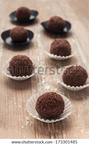 Homemade chocolate truffle with chocolate chips on the surface