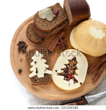 Rye bread, cheese and spices, a sandwich for the new year, decoration for Christmas