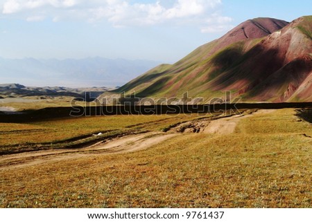 Wide angle view at beautiful colorful hills and rolling landscape.