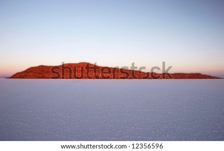 Drought feature land with beautiful geological feature in background. Salar Uyuni. Bolivia