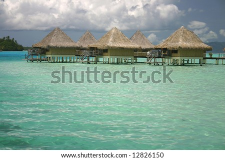 Over water bungalows at Bora Bora summer resort. Pacific Island Bora Bora. French Polynesia