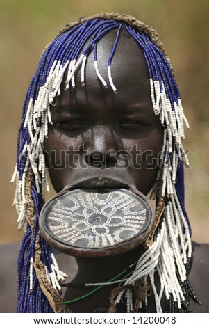 ETHIOPIA - UNKNOWN: A female member of the Mursi (or Murzu) woman wearing plate in her lower lips in this undated image taken in the Debub Omo Zone area of Ethipoia.