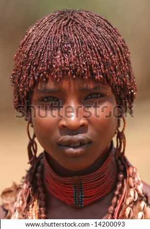 stock photo ETHIOPIA UNKNOWN A young African girl wears traditional 