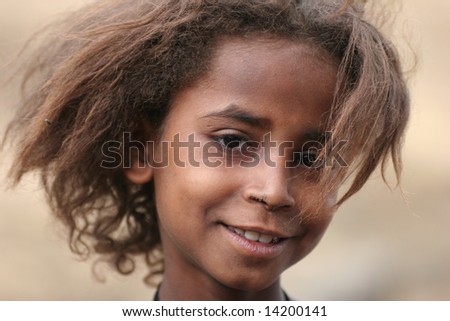 ETHIOPIA - UNKNOWN: A young girl stands and poses for a portrait in this undated image taken in Ethiopia.
