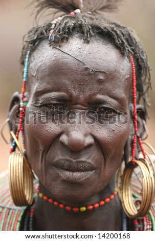 KENYA - UNKNOWN: A African Tribal Ethnic woman poses for a portrait in this undated image taken in Kenya.