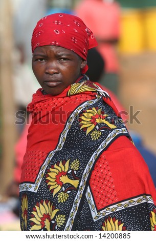 TANZANIA - UNKNOWN: A woman wearing traditional clothes stands in this undated image taken in Tanzania.