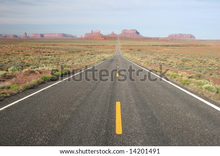 View of Monument Valley in Utah, looking south on highway. Arizona/Utah State line. USA